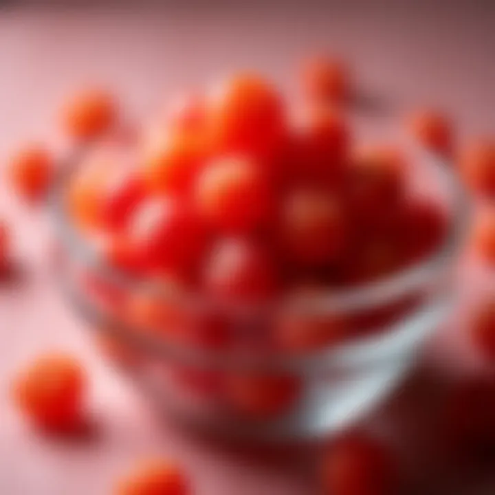 A vibrant display of canned litchi fruit in a glass bowl, showcasing its texture and color.