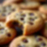 A close-up of flat raisin cookies showcasing their texture and golden-brown color