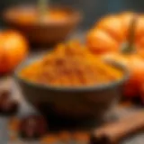 A bowl filled with Krusteaz Pumpkin Muffin Mix alongside fresh pumpkins and spices