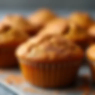 Deliciously baked pumpkin muffins topped with a sprinkle of cinnamon